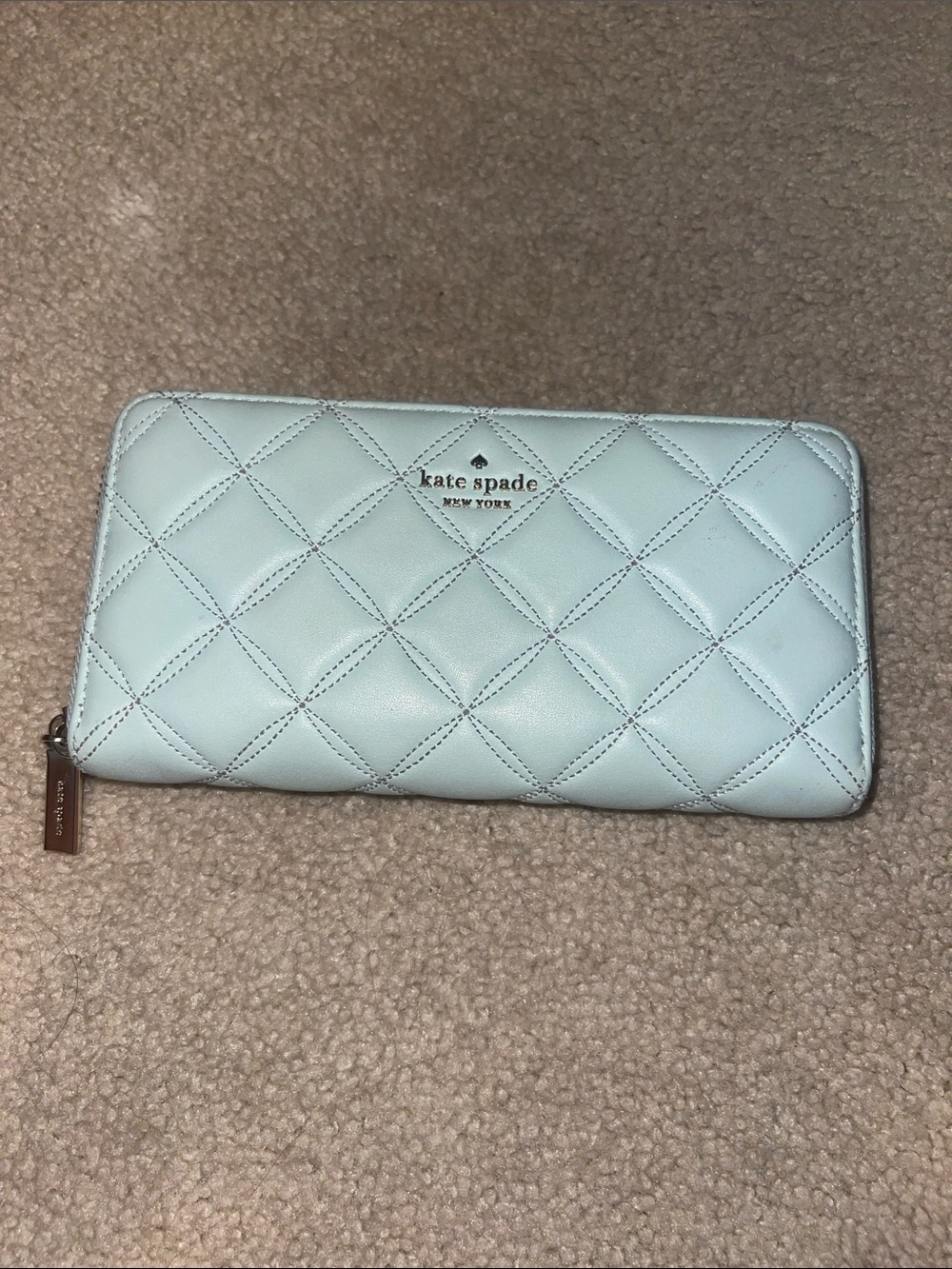 kate spade Quilted Zip-Around Wallet in Pale Blue with Gold Logo